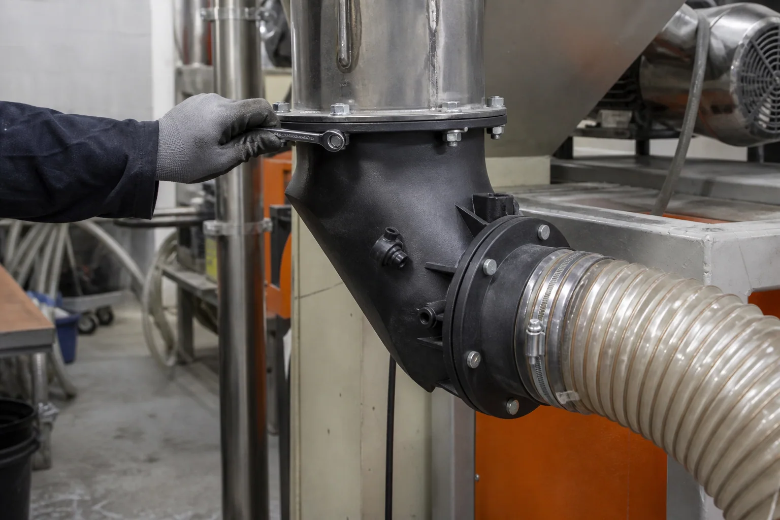 PET-CF printed hot-air transition duct installed between an industrial dryer and flexible process hose